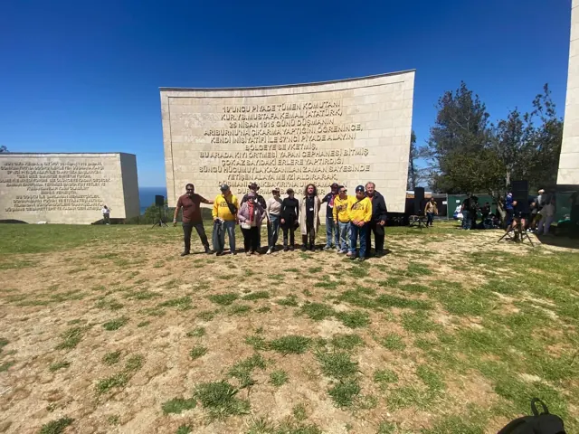 Travellers gathered at the Chunuk Bair commemorative wall.