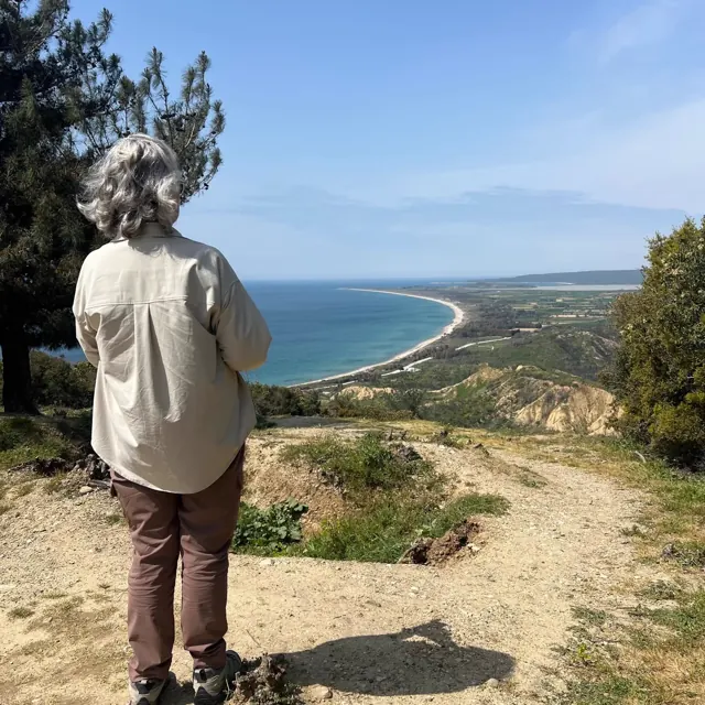 A guest looking out over the coastline from the Gallipoli hills.