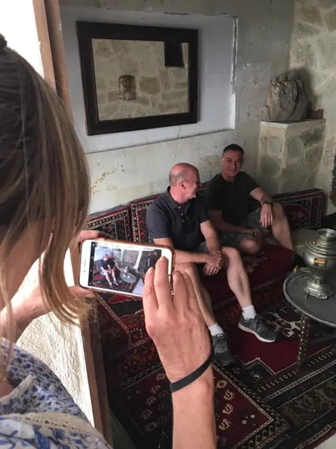 Guests sharing a meal during their Türkiye trip.